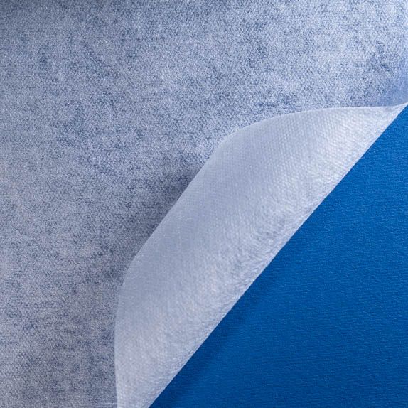 Type 2112 70gsm Superabsorbent Thermo-Carded Nonwoven Fabric shown rolled on a blue background