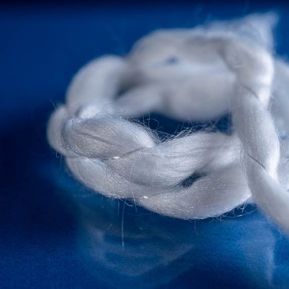 Superabsorbent Yarn Netting close up on a blue background